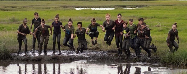 2019 Quest Students Jump in the Mud Bog